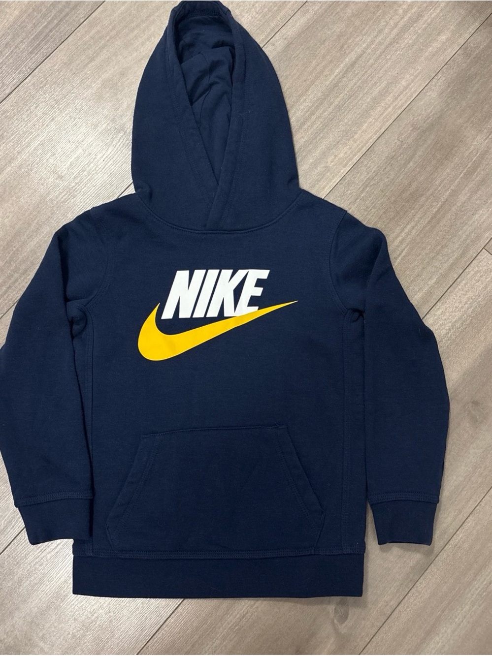 Nike Kids Navy Hoodie with White Logo and Yellow Swoosh